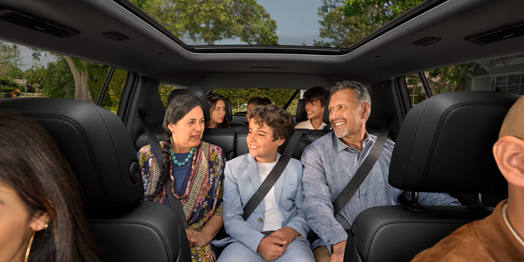 Interior of the 2026 Chevy Traverse with family in seats