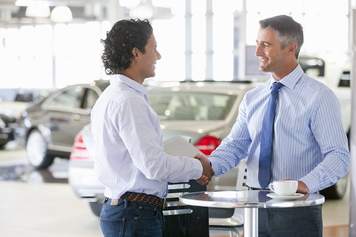 Chevy dealer shaking hands with a client
