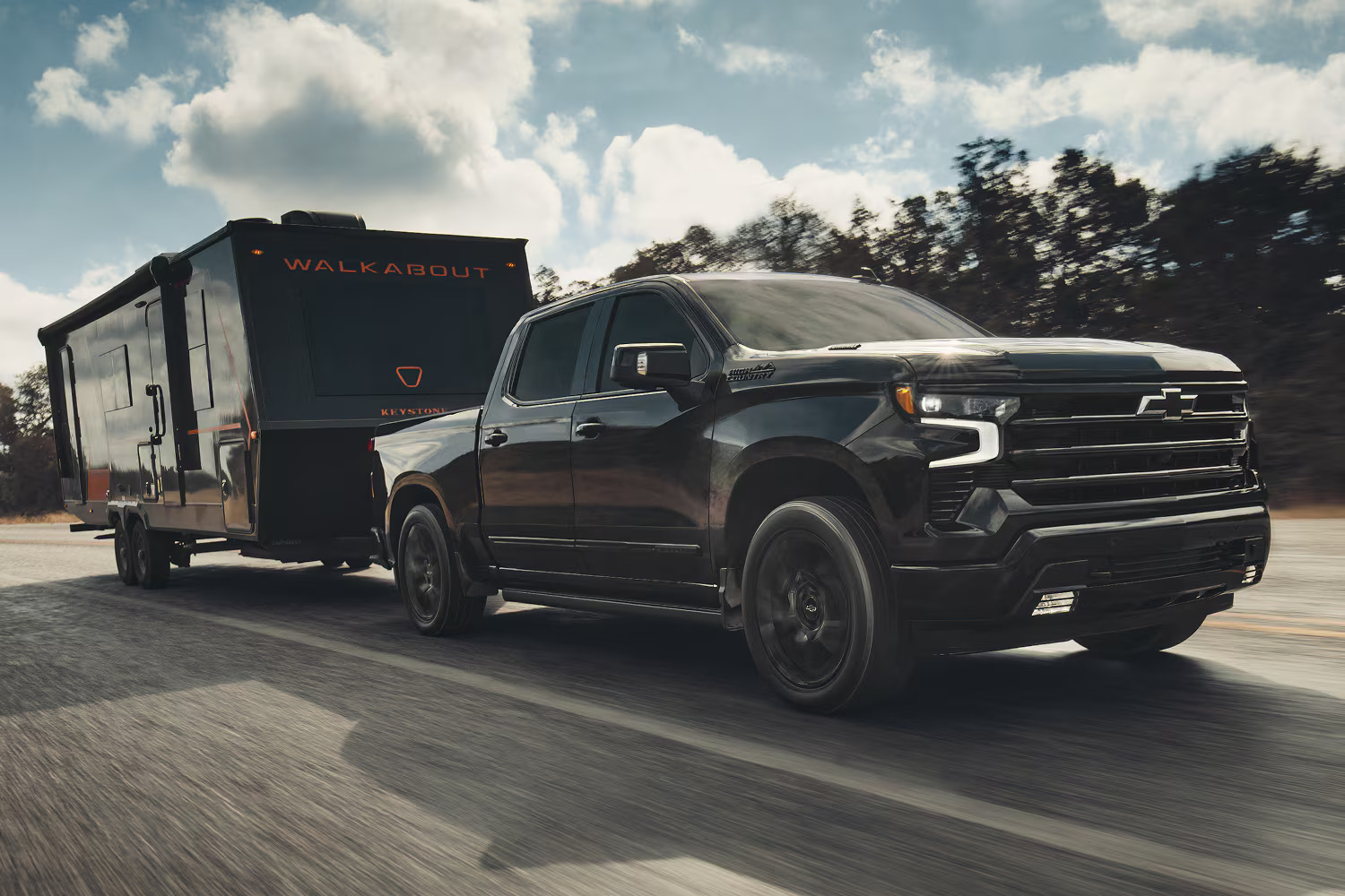 2026 Chevrolet Silverado 1500 towing a trailer