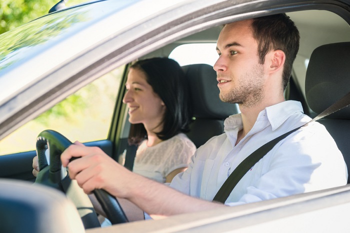Couple in a car during a test drive