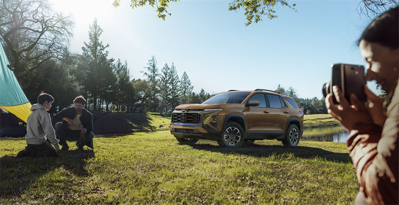 2027 Chevrolet Equinox outside with a family
